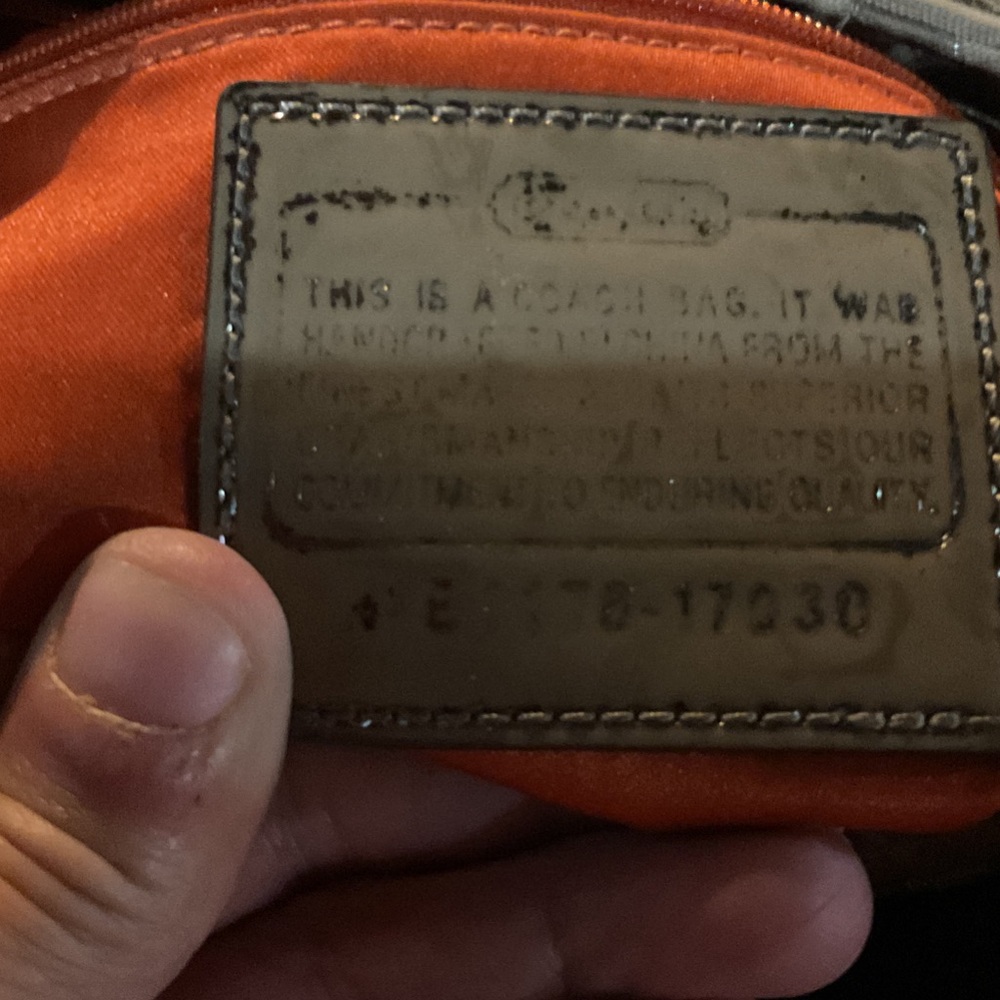 Coach vintage tan with kissing c’s